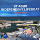 St Abbs Independent Lifeboat Calendar. Harbour scene with rainbow